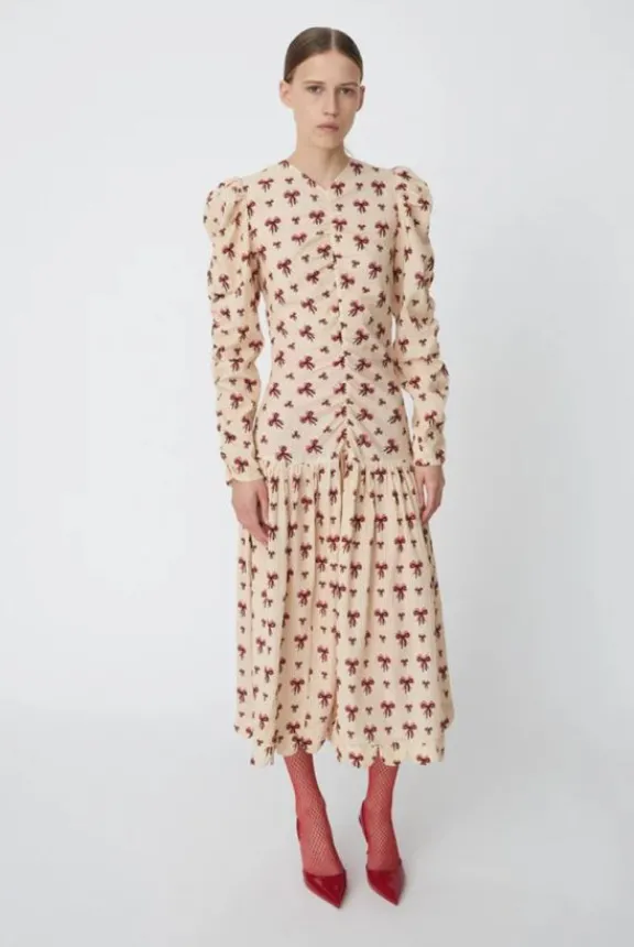 midi_dress_with_allover_b_4.webp Stella Nova Midi Dress with Allover Bow Print - Latte | Dresses