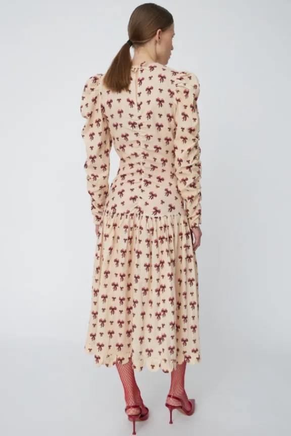 midi_dress_with_allover_b_6.webp Stella Nova Midi Dress with Allover Bow Print - Latte | Dresses