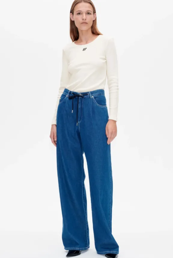 nanny_trousers__light_wor_5.webp Baum Und Pferdgarten Nanny Trousers - Light Worn Denim | Trousers And Playsuits | Suits & Co-Ordinates