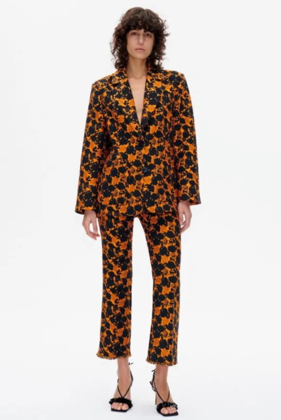 nenne_trousers__orange_bl_2.webp Baum Und Pferdgarten Nenne Trousers - Orange Black Flower | Trousers And Playsuits | Suits & Co-Ordinates